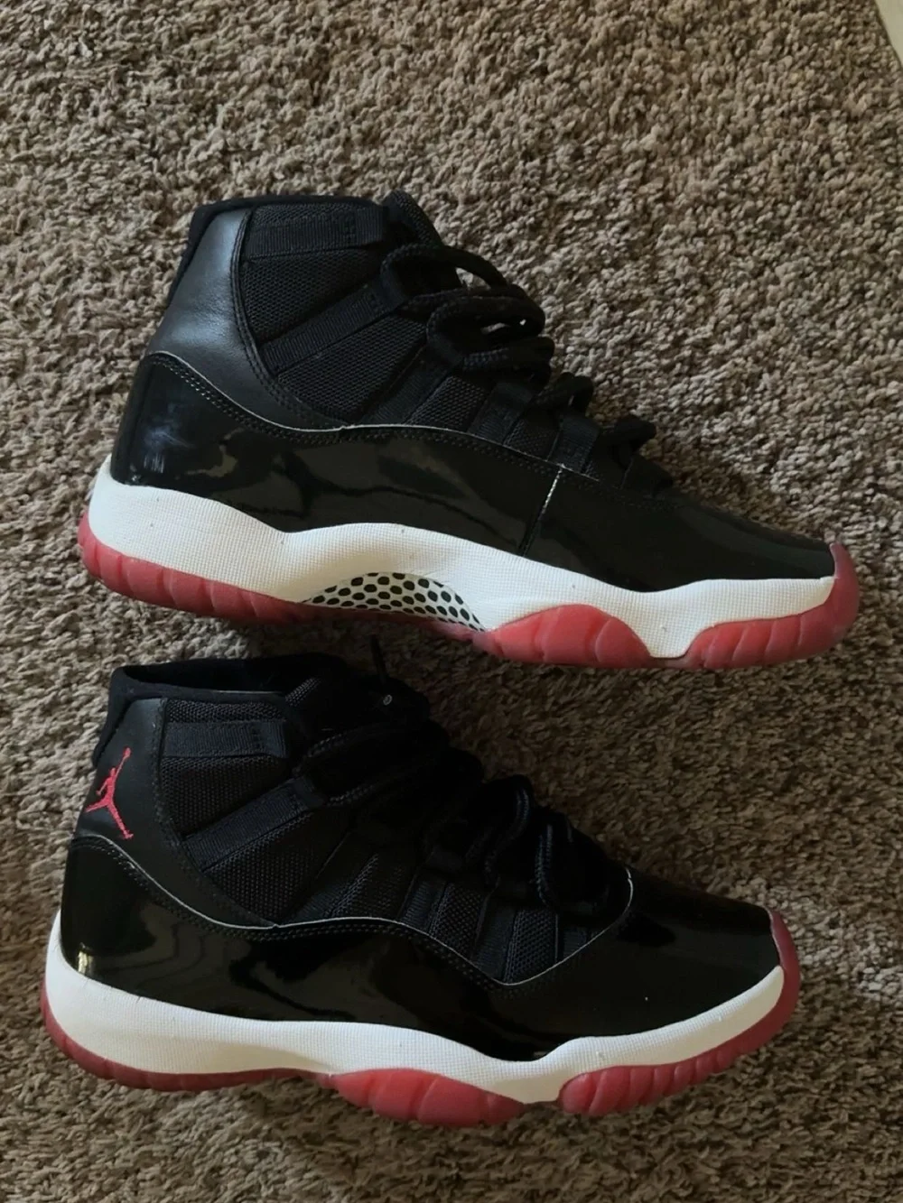 Jordan 11’s High-Top Sneakers “Bred”